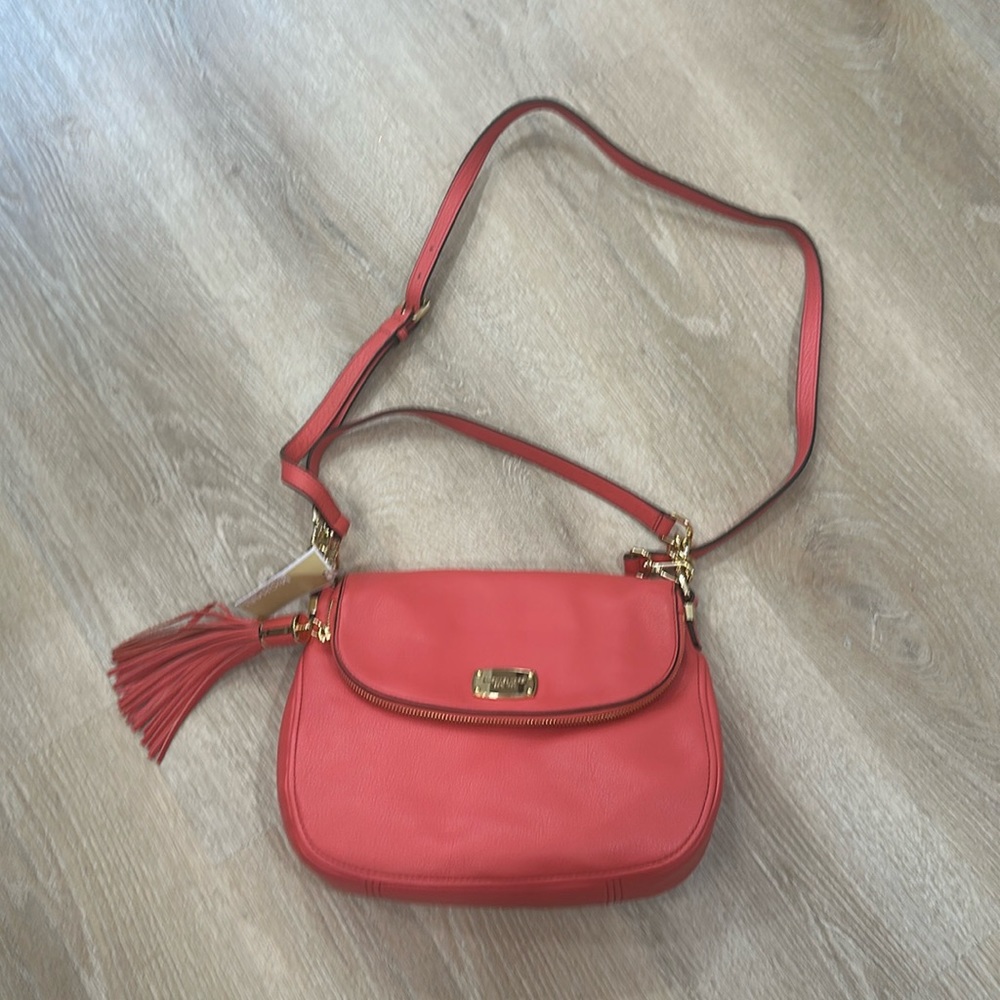 Michael Kors Bedford shoulder bag with adjust crossbody strap.